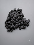 Small black pebbles